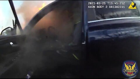 Officers Rescue Unresponsive Driver From Burning Car