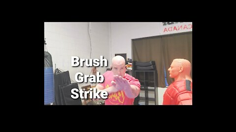 Brush grab Strike