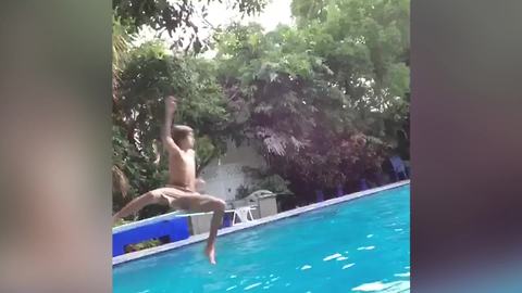 Boy Jumps In The Pool And Fails