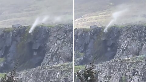 Incredible winds force waterfall to flow up into the air