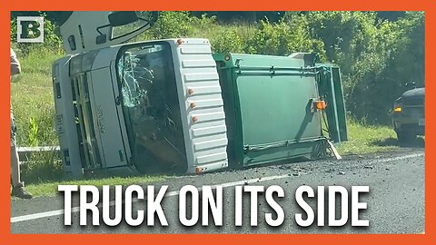 Truck Seen Flipped on Its Side on Busy Highway Outside of Residential Neighborhood