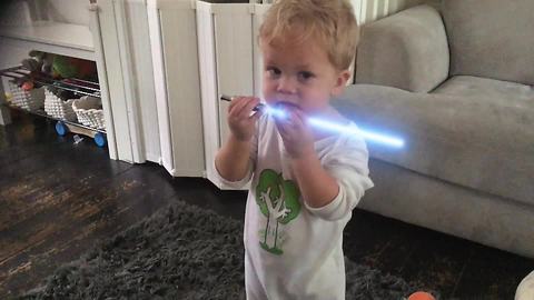 Little boy displays lightsaber skills like true Jedi