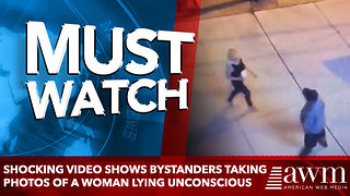 Shocking video shows bystanders taking PHOTOS of a woman lying unconscious