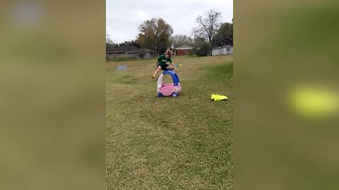 Sibling Rivalry: Three Kids Jumping Over Toy Car