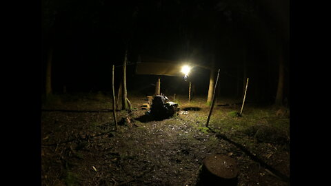 digging the fire pit under a tarp. Using the Rode Wireless Go.