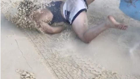 Guy Faceplants At The Beach, Shrugs It Off