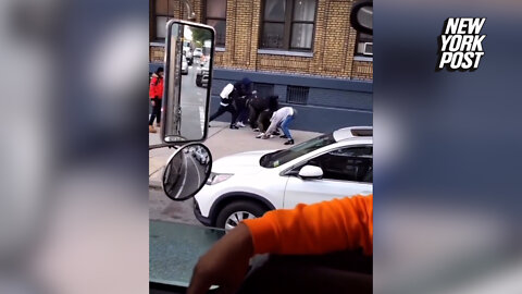 Video shows a gang of teens swarming a 15-year-old boy and kicking him repeatedly while stealing his sneakers