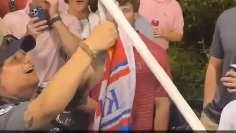 WTH? University Of Arkansas Police Cut Down A Pro-Trump Flag At The Ole Miss Baseball Game