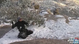 People enjoy a white Christmas up on Mt. Lemmon