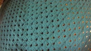 left handed Crochet Granny Square shawl.
