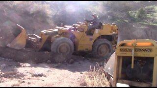 Yanmar Mini-ex Digging In A Parking Area