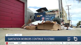 Sanitation workers continue to strike