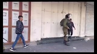 lsraeli Apartheid occupation forces detain 2 Palestinian children walking to the doctor in Hebron.