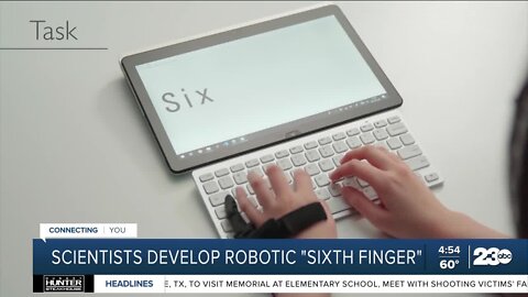 Scientists develop wearable artificial sixth finger