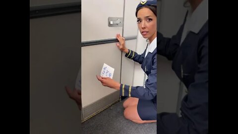 Flight attendent helps woman who had an accident on the plane …