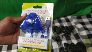 Comprei um Adaptador PS2 para USB