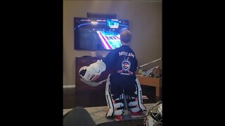 Commerce City boy trains in his full goalie gear while watching Avalanche games