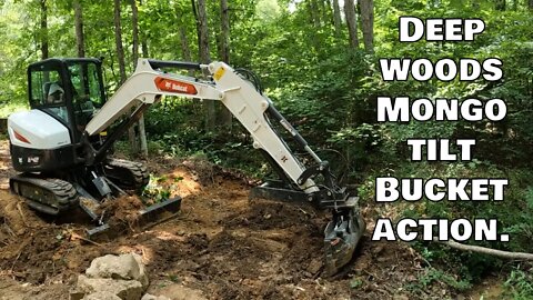 Re-routing ditch and grading new hillside with Mongo tilt bucket & Bobcat e42 R2 series-time lapse