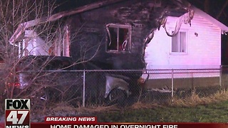Home damaged in overnight fire in Lansing