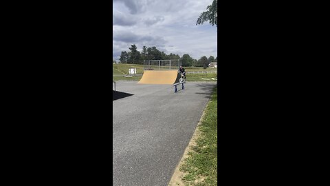 Small skatepark Bmx wheelie done the stairs