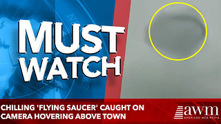 Chilling 'flying saucer' caught on camera hovering above town