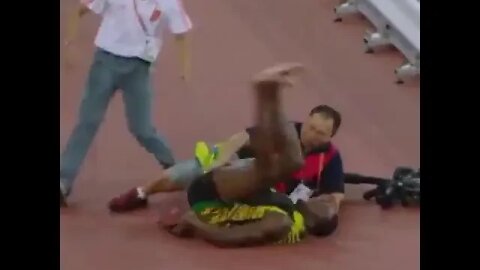 Cammeraman On A Segway Takes Usain Bolt Out