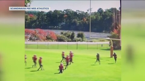 Pee Wee football players get a lesson in sportsmanship