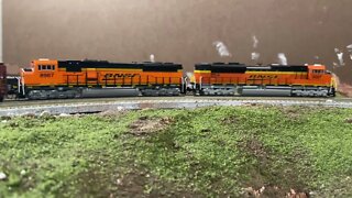 N Scale tank train struggling up a grade