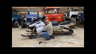 Installing a snowmobile wrap on a Polaris RMK.