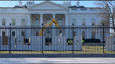 Why is a concrete wall being built around the white house?