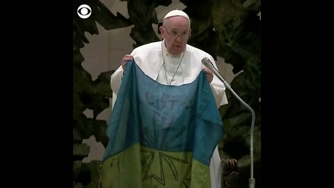 New- Pope kisses Ukraine flag.