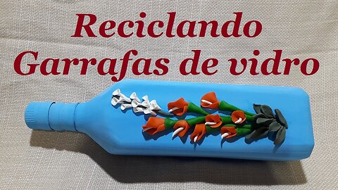 GARRAFA DECORADA COM FLORES DE MASSA DE BISCUIT (PORCELANA FRIA) @lucibuzo ​