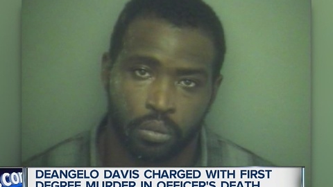 Davis charged with officer's murder