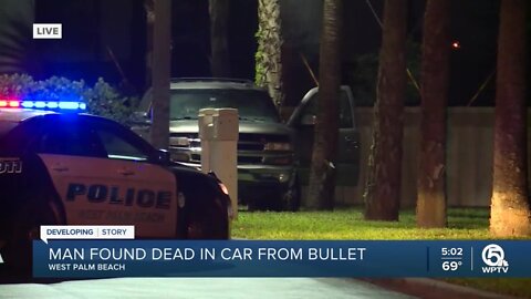 Man found shot dead in car at apartment complex