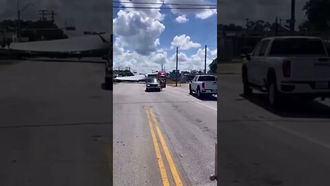 18 wheeler hauling a wind turbine gets stuck on the tracks😳#shorts #crazyvideo #traincrash