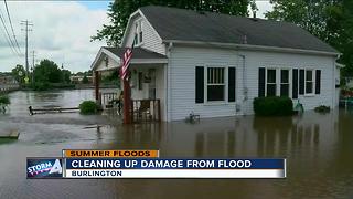 Homeowners cleaning up after flash floods