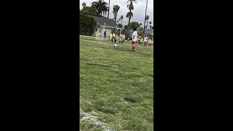 My lil bro taking a free kick