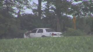 RAW: Video shows man who tried to break into FBI office in Cincinnati hiding behind car in standoff