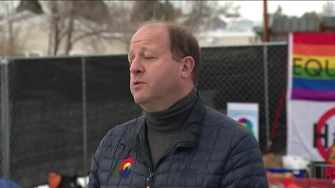 'Club Q will be back. The community will be back': Gov. Polis tours site of mass shooting in Colorado Springs