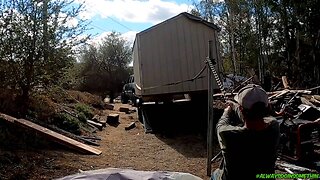 Unloading shed off trailer