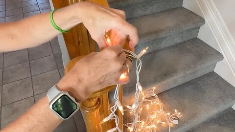 Wrap lights around your bannister for this BRILLIANT new Christmas idea!