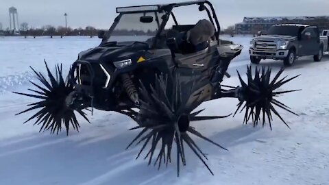 An experimental all-terrain vehicle with wheels made of huge thorns