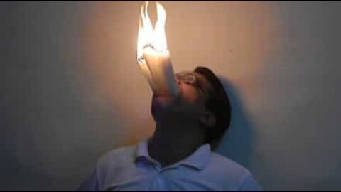 Man puts 22 lit candles in his mouth