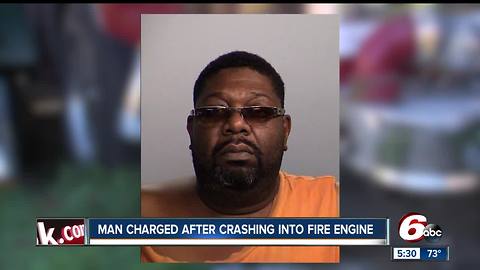 Man charged after crashing into Indianapolis fire truck