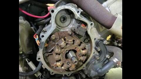 2002 Polaris Sportsman 700- Part 3 - fixing stripped threads and cleaning up the flywheel & stator.