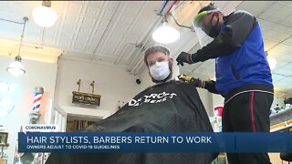 Hair stylists, barbers return to work in Michigan