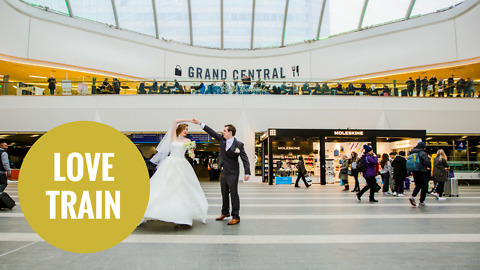 Newlywed couple pose for their marriage photos at train station