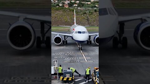 Guiding the British Airways plane onto its stand at Funchal Airport, Madeira