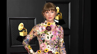 Taylor Swift wins the coveted Album of the Year Grammy award