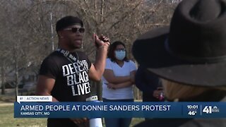 Armed people at Donnie Sanders protest